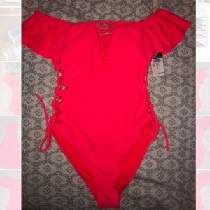 Off the shoulder pink one piece bathing suit